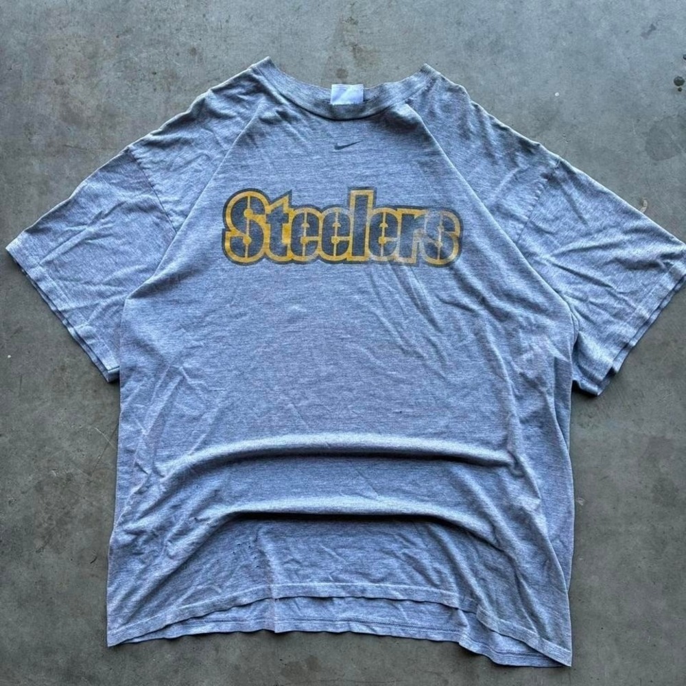 Faded grey center‎ swoosh Steelers shirt with great thrashing and distressing